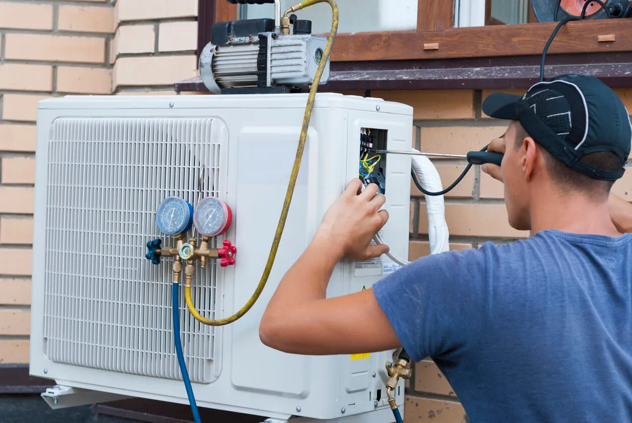 Air conditioning unit outdoor condenser repair by trained professional